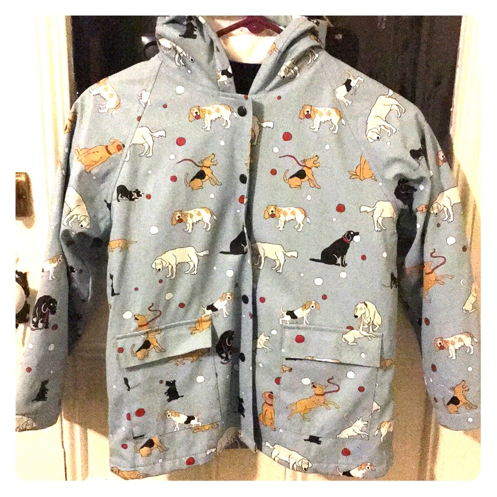 Rain coat with dogs playing.